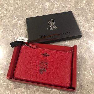 NWT Coach x Disney Minnie Mouse motif wristlet.